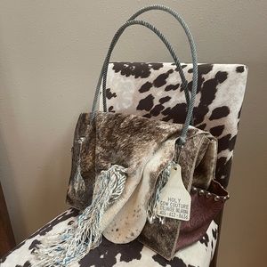 Holy cow couture handbag. Beautiful, gently used purse.